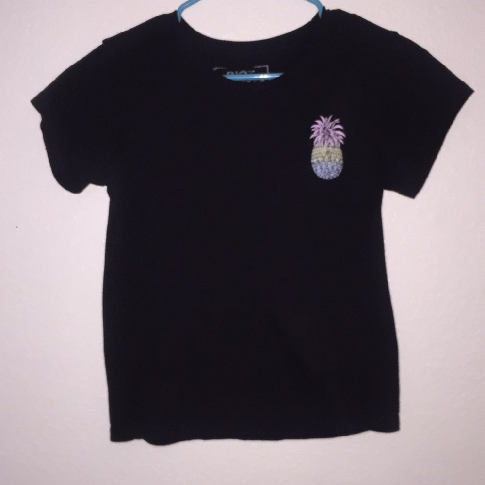 A all black Tee with a fun and colorful pineapple